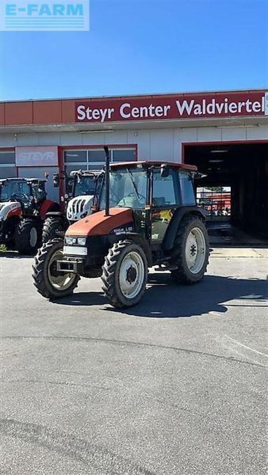 New Holland l65 - Трактор: фото 1 New Holland l65 - Трактор: фото 1