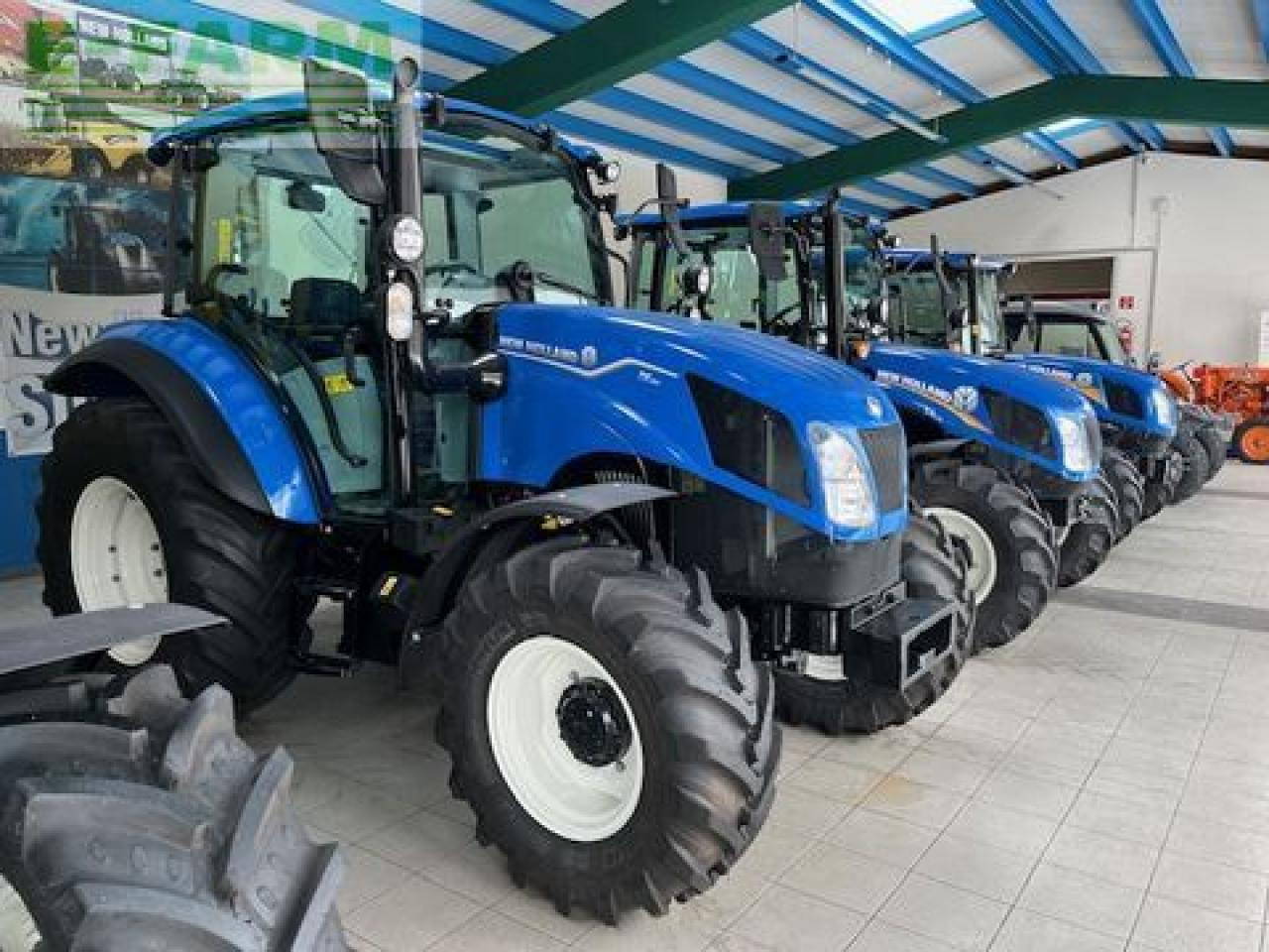 New Holland t5.90 powershuttle - Трактор: фото 2 New Holland t5.90 powershuttle - Трактор: фото 2