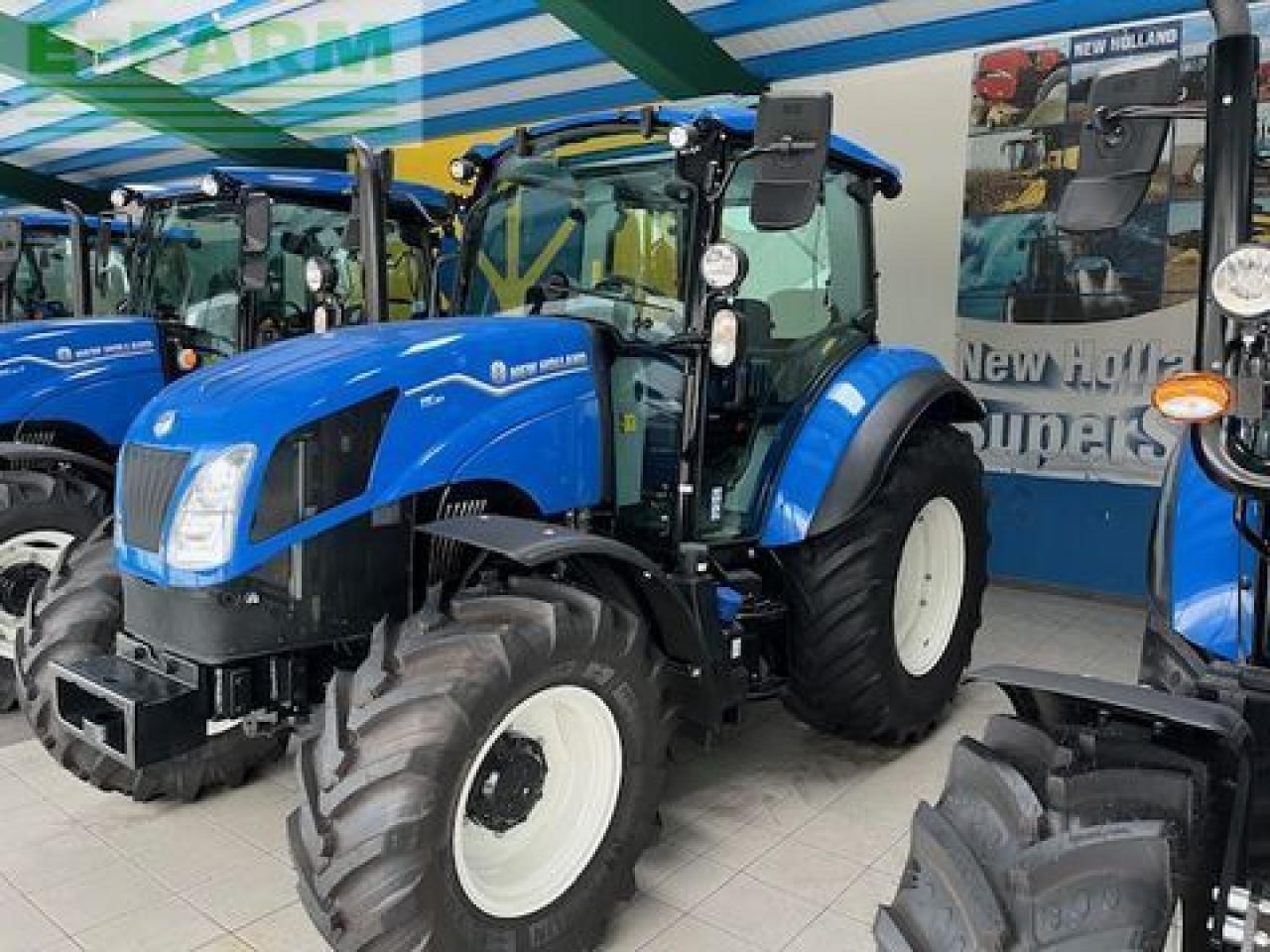 New Holland t5.90 powershuttle - Трактор: фото 1 New Holland t5.90 powershuttle - Трактор: фото 1