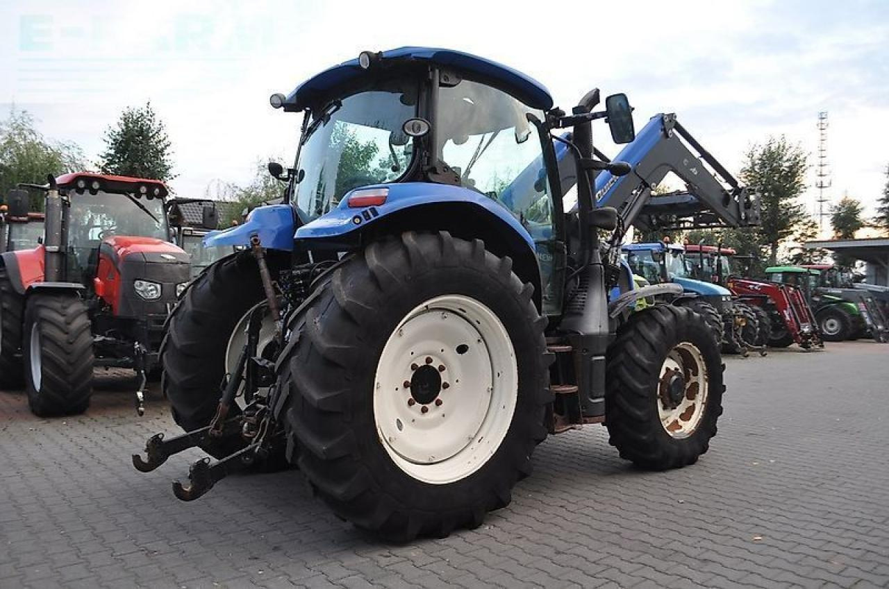 New Holland t6.140 + quicke q56 - Трактор: фото 5 New Holland t6.140 + quicke q56 - Трактор: фото 5