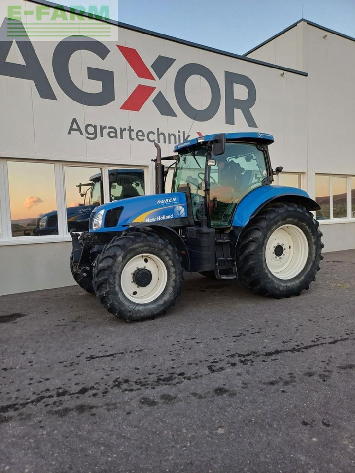 New Holland t6050 range & power command - Трактор: фото 1 New Holland t6050 range & power command - Трактор: фото 1