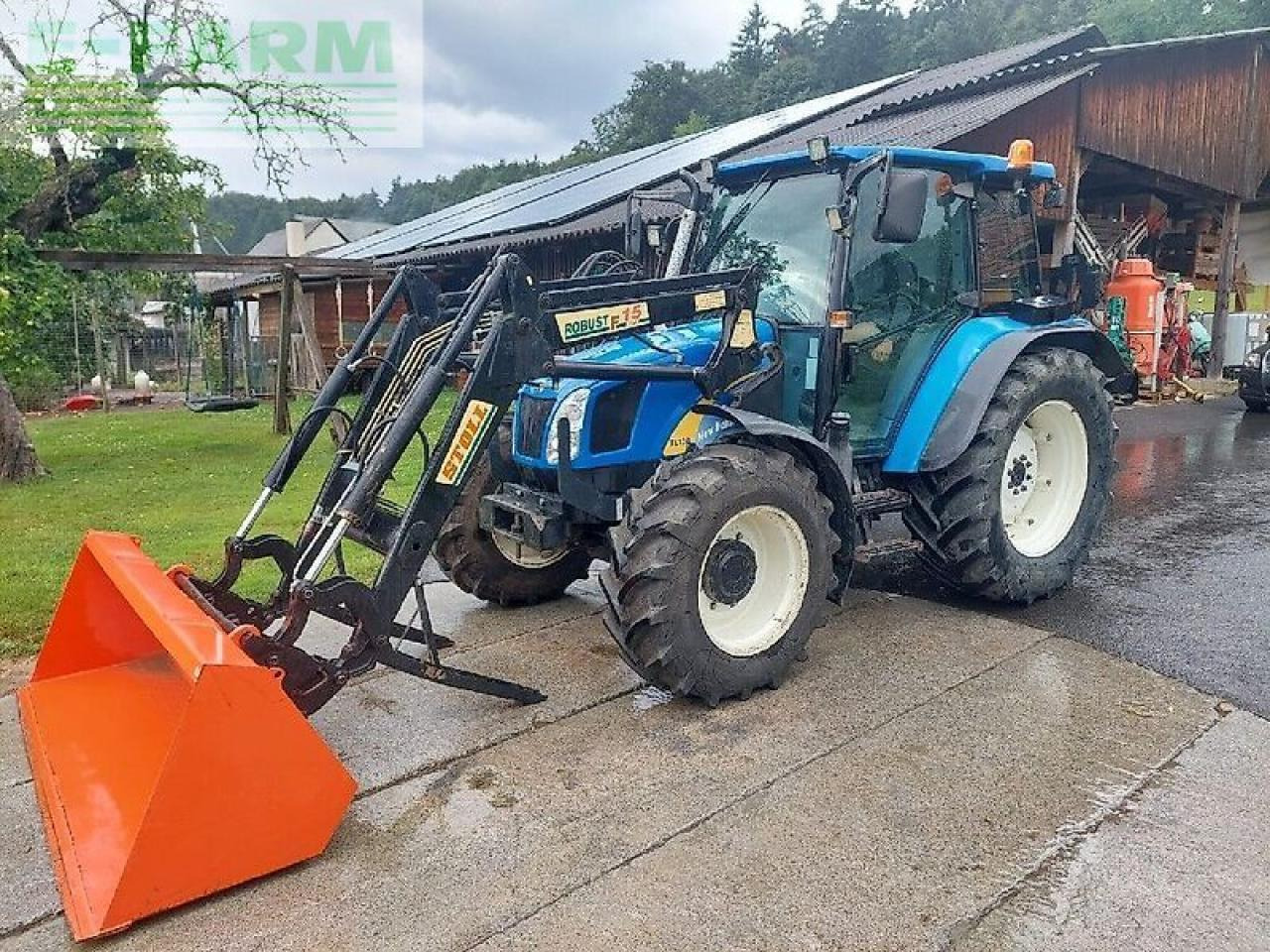 New Holland tl 90 a A - Трактор: фото 1 New Holland tl 90 a A - Трактор: фото 1