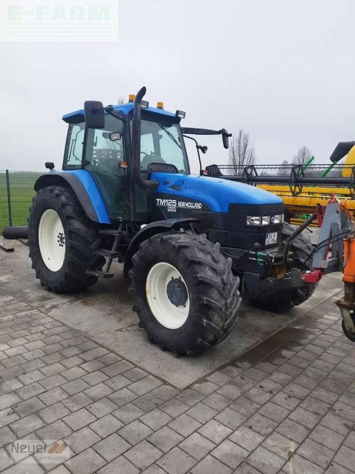 New Holland tm 125 - Трактор: фото 3 New Holland tm 125 - Трактор: фото 3