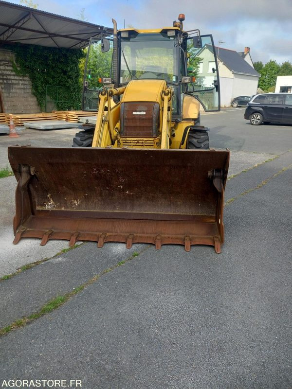 Chargeuse Pelleteuse - Экскаватор-погрузчик: фото 1 Chargeuse Pelleteuse - Экскаватор-погрузчик: фото 1