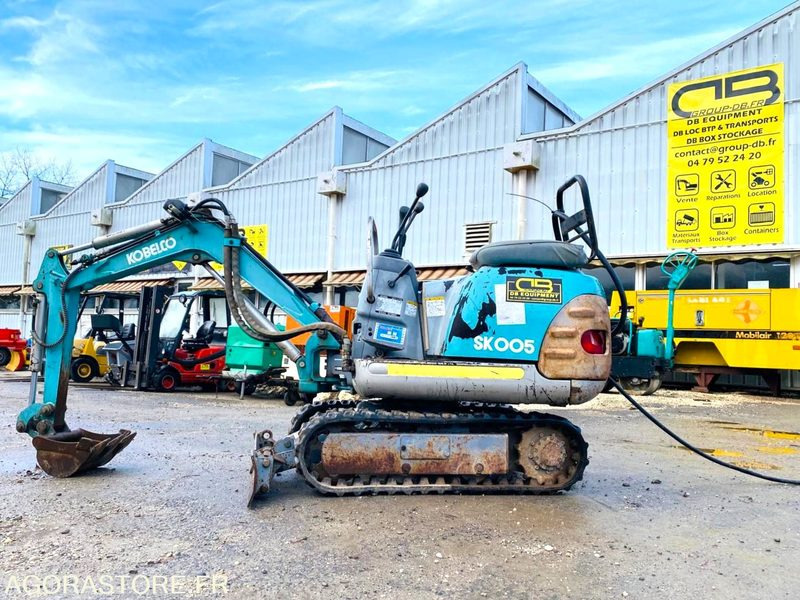 Mini-pelle électrique sur groupe KOBELCO SK005 - Année 1993 - Экскаватор: фото 5 Mini-pelle électrique sur groupe KOBELCO SK005 - Année 1993 - Экскаватор: фото 5