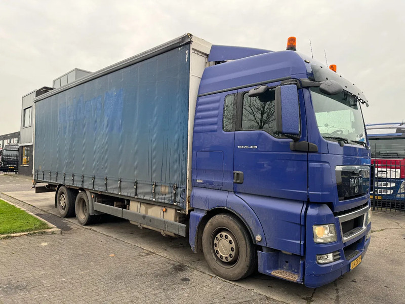 MAN TGX 26.400 6X2 - EURO 4 + LIFT + STEERING AXLE + TÜV 10-2025 - Тентованный грузовик: фото 3 MAN TGX 26.400 6X2 - EURO 4 + LIFT + STEERING AXLE + TÜV 10-2025 - Тентованный грузовик: фото 3