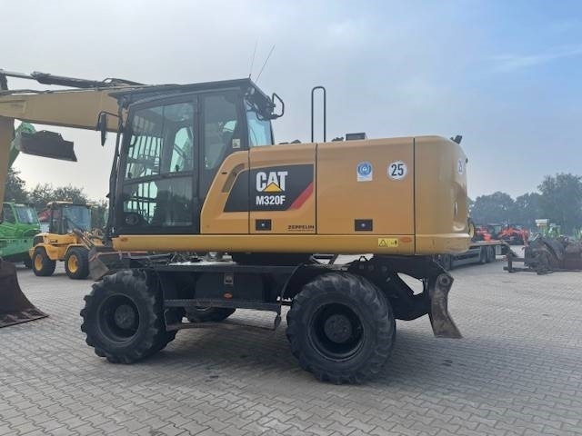CAT M 320 F - Колёсный экскаватор: фото 3 CAT M 320 F - Колёсный экскаватор: фото 3