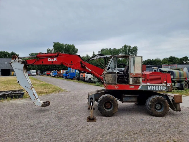 O & K MH6HD - Колёсный экскаватор: фото 1 O & K MH6HD - Колёсный экскаватор: фото 1