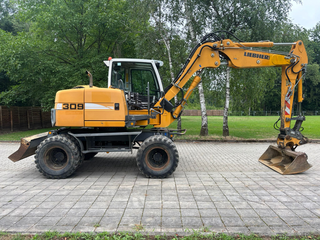 LIEBHERR A 309 Litronic - Колёсный экскаватор: фото 2 LIEBHERR A 309 Litronic - Колёсный экскаватор: фото 2