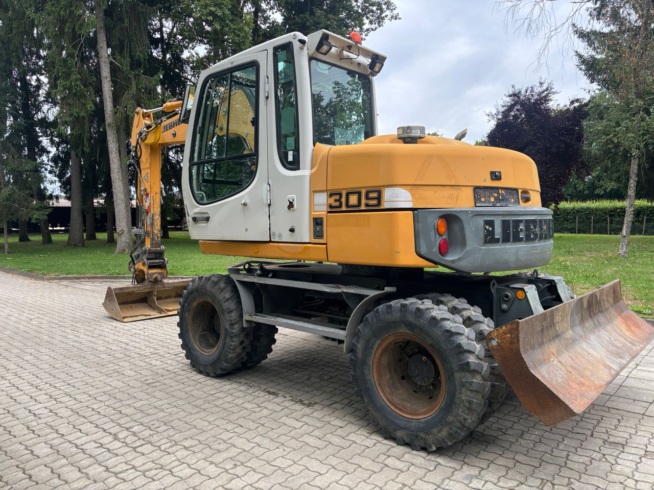 LIEBHERR A 309 Litronic - Колёсный экскаватор: фото 5 LIEBHERR A 309 Litronic - Колёсный экскаватор: фото 5