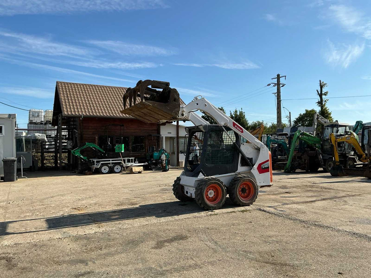 Bobcat S450 - Мини-погрузчик с бортовым поворотом: фото 1 Bobcat S450 - Мини-погрузчик с бортовым поворотом: фото 1