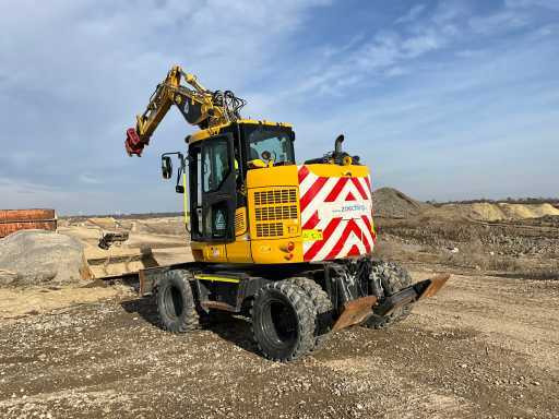 Komatsu PW118MR-11 - Колёсный экскаватор: фото 2 Komatsu PW118MR-11 - Колёсный экскаватор: фото 2