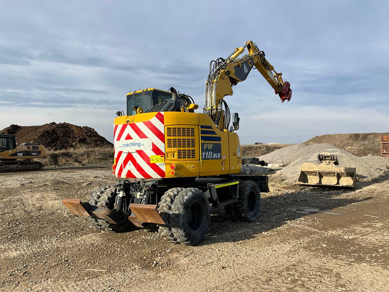 Komatsu PW118MR-11 - Колёсный экскаватор: фото 1 Komatsu PW118MR-11 - Колёсный экскаватор: фото 1