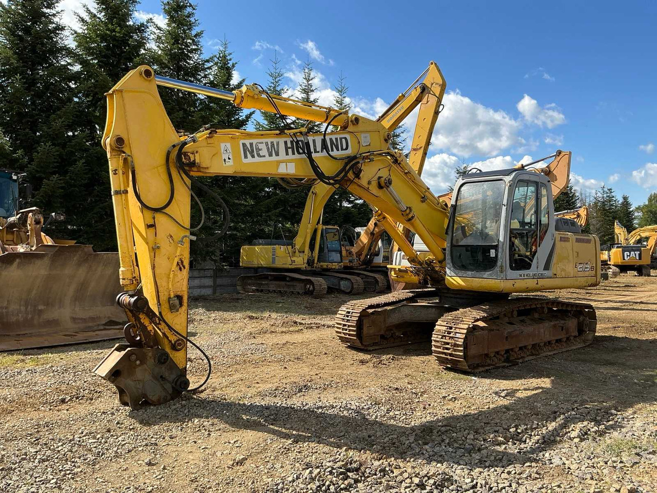 NEW HOLLAND KOBELCO E 215B - Гусеничный экскаватор: фото 1 NEW HOLLAND KOBELCO E 215B - Гусеничный экскаватор: фото 1