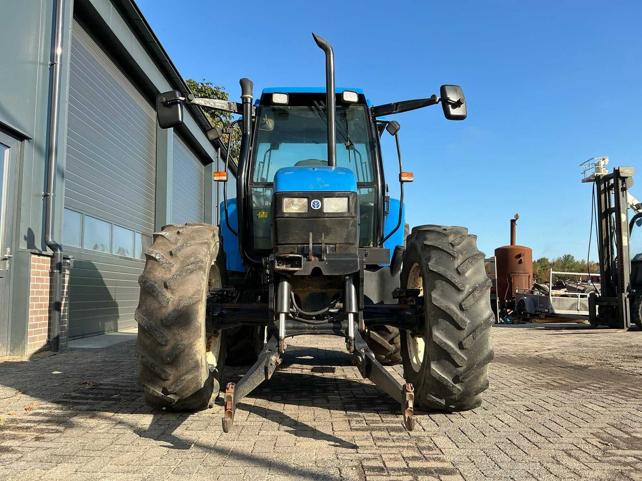 Трактор New Holland TS100: фото 25
