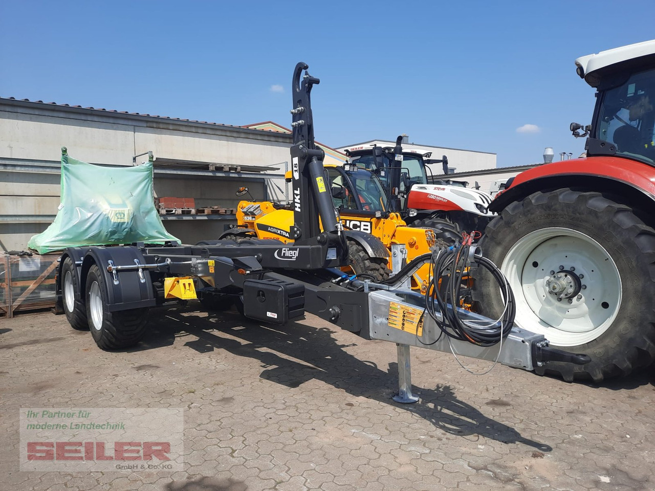 Fliegl HKL 18 Abrollkipper - Прицеп мультилифт/ Бункеровоз: фото 1 Fliegl HKL 18 Abrollkipper - Прицеп мультилифт/ Бункеровоз: фото 1