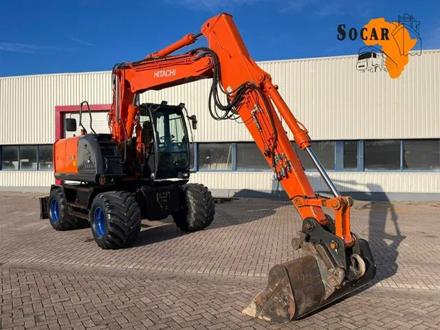 Hitachi ZX 140W-3 - Колёсный экскаватор: фото 1 Hitachi ZX 140W-3 - Колёсный экскаватор: фото 1