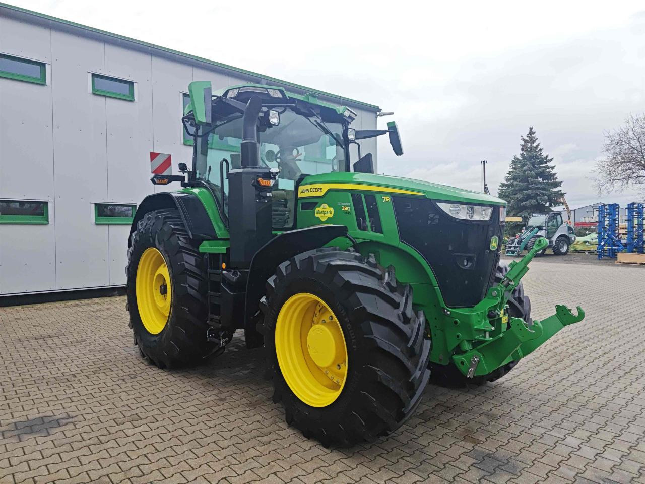 John Deere 7R 330 - Трактор: фото 1 John Deere 7R 330 - Трактор: фото 1