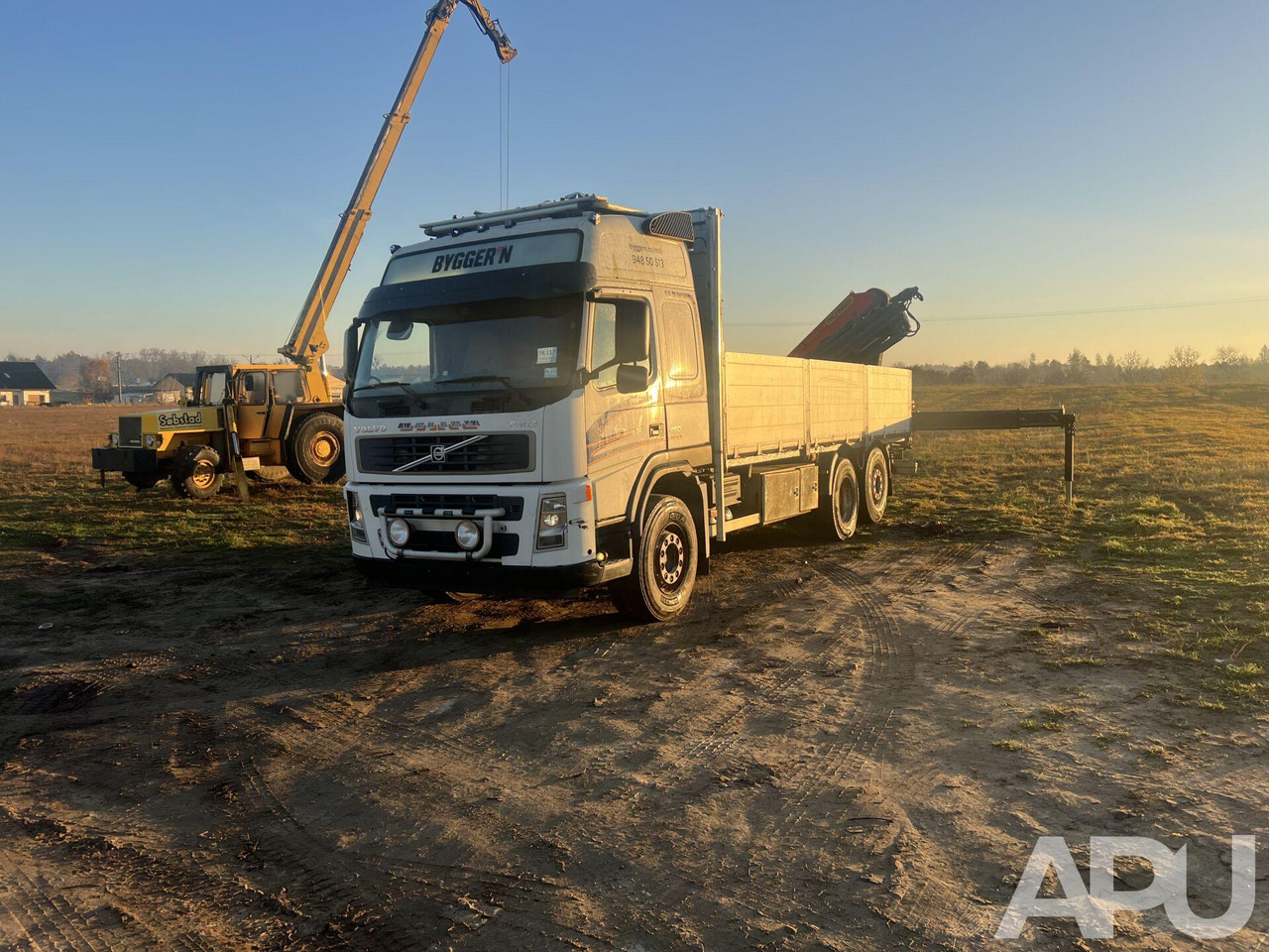 Volvo FM12 - Грузовик бортовой/ Платформа, Автоманипулятор: фото 1 Volvo FM12 - Грузовик бортовой/ Платформа, Автоманипулятор: фото 1