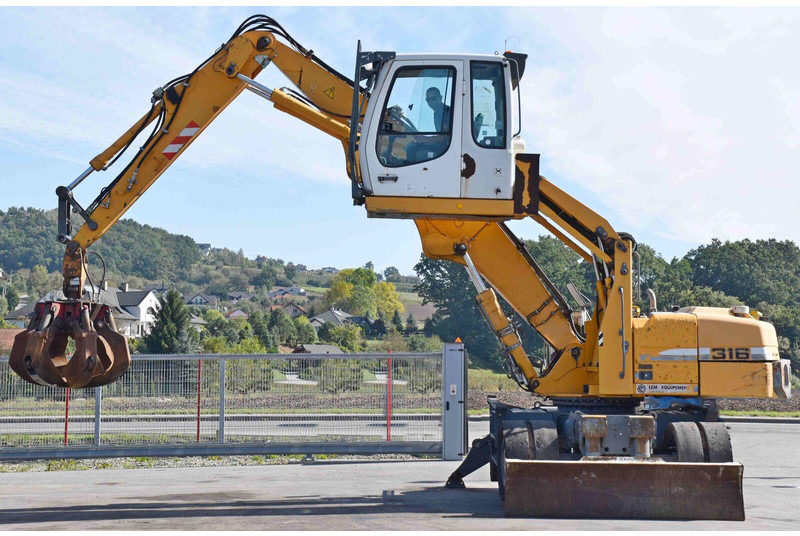 Колёсный экскаватор Liebherr PELLE A316: фото 7