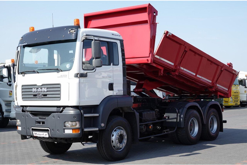 MAN TGA 33.390 / 6X4 / WYWROTKA 2 STRONNA / HYDROBURTA / MANUAL / SP - Самосвал: фото 1 MAN TGA 33.390 / 6X4 / WYWROTKA 2 STRONNA / HYDROBURTA / MANUAL / SP - Самосвал: фото 1