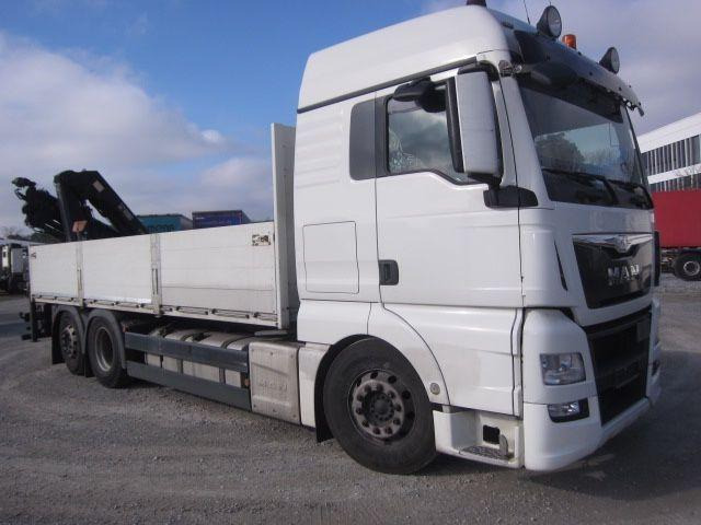 MAN TGX 26.440 mit Hiab-Kran Funkfernbedienung - Грузовик бортовой/ Платформа, Автоманипулятор: фото 1 MAN TGX 26.440 mit Hiab-Kran Funkfernbedienung - Грузовик бортовой/ Платформа, Автоманипулятор: фото 1