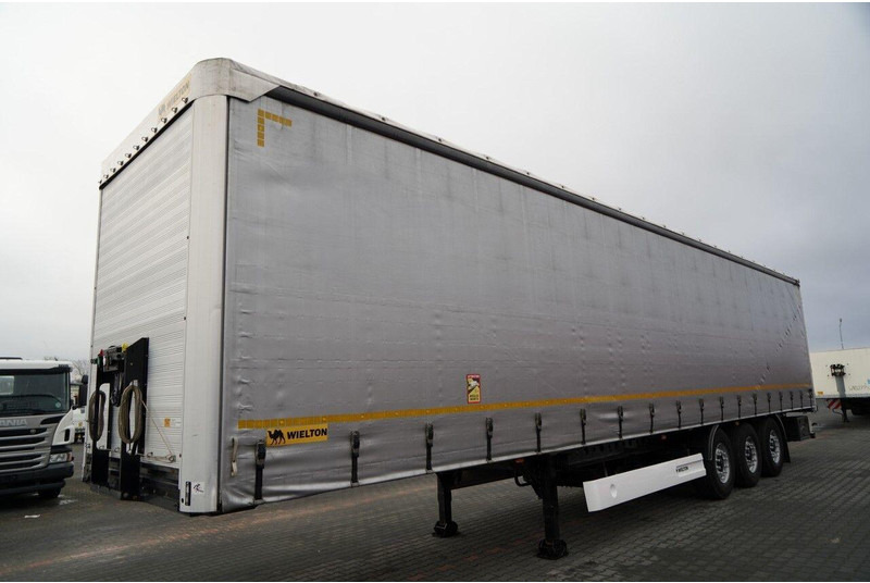 Wielton FIRANKA / STANDARD / OŚ PODNOSZONA / PLANDEKA ZBROJONA - Тентованный полуприцеп: фото 4 Wielton FIRANKA / STANDARD / OŚ PODNOSZONA / PLANDEKA ZBROJONA - Тентованный полуприцеп: фото 4