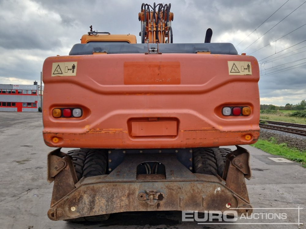 Doosan DX210W - Колёсный экскаватор: фото 4 Doosan DX210W - Колёсный экскаватор: фото 4