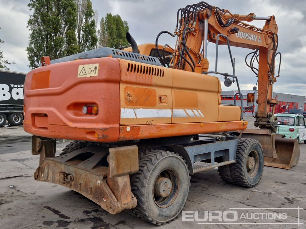 Doosan DX210W - Колёсный экскаватор: фото 5 Doosan DX210W - Колёсный экскаватор: фото 5