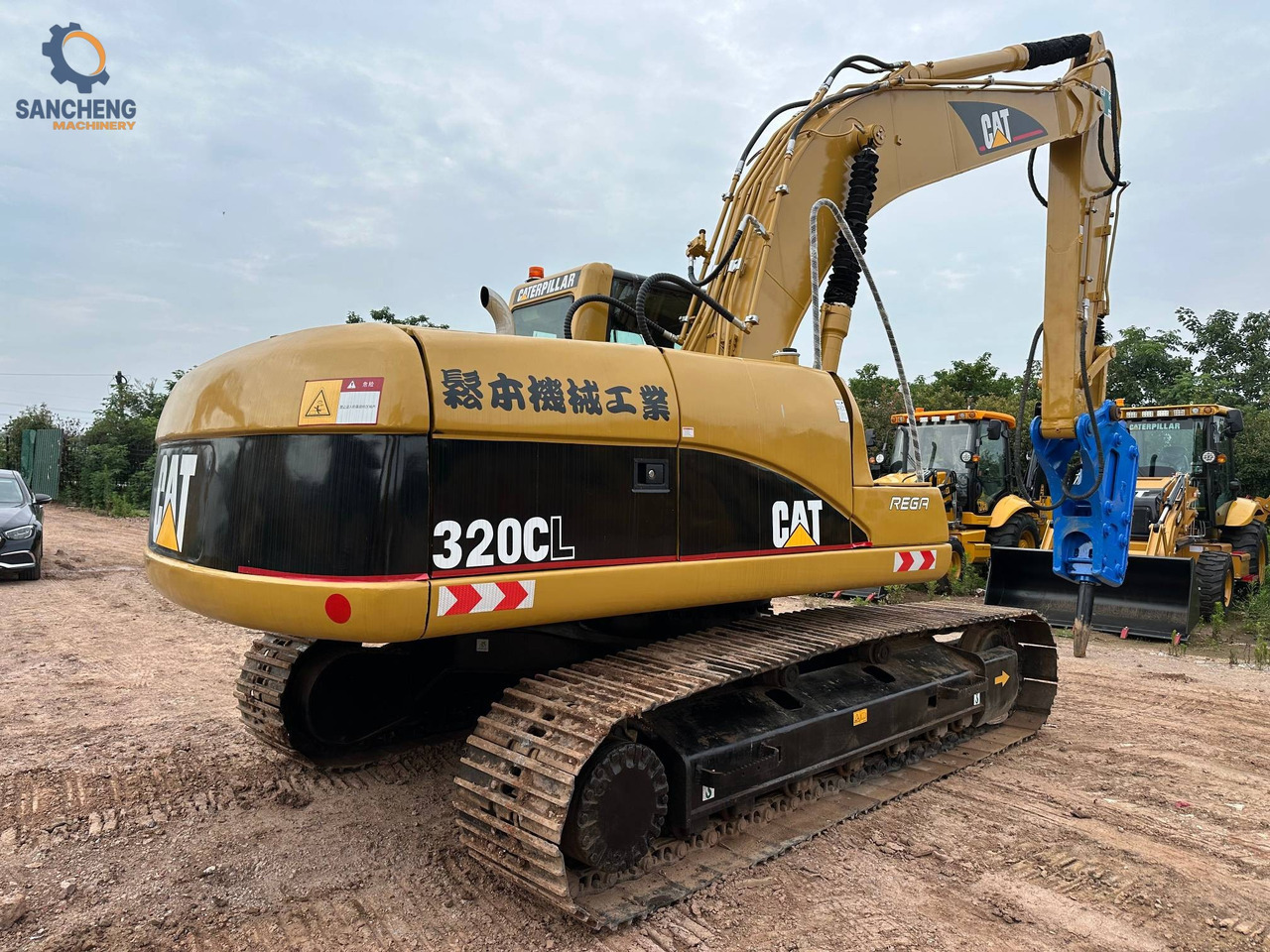 CAT 320CL with hammer - Гусеничный экскаватор: фото 1 CAT 320CL with hammer - Гусеничный экскаватор: фото 1