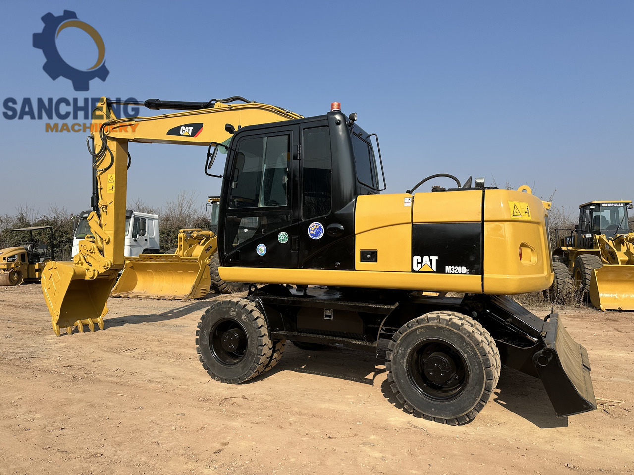CATERPILLAR M320D2 - Колёсный экскаватор: фото 1 CATERPILLAR M320D2 - Колёсный экскаватор: фото 1