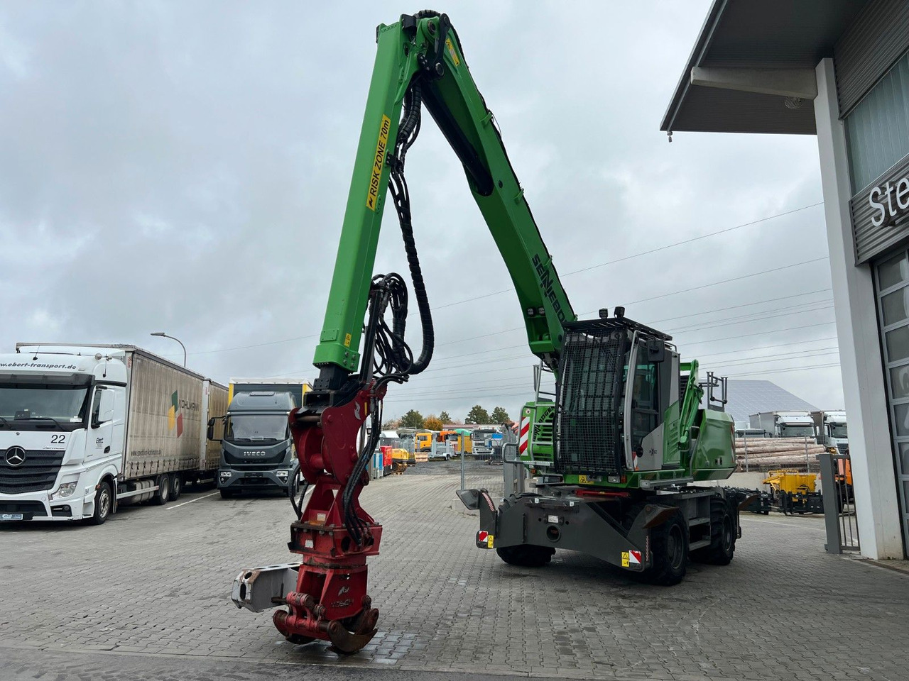 Sennebogen 718 / inkl. Vosch Fällzange / nur 1.965h! - Колёсный экскаватор: фото 5 Sennebogen 718 / inkl. Vosch Fällzange / nur 1.965h! - Колёсный экскаватор: фото 5