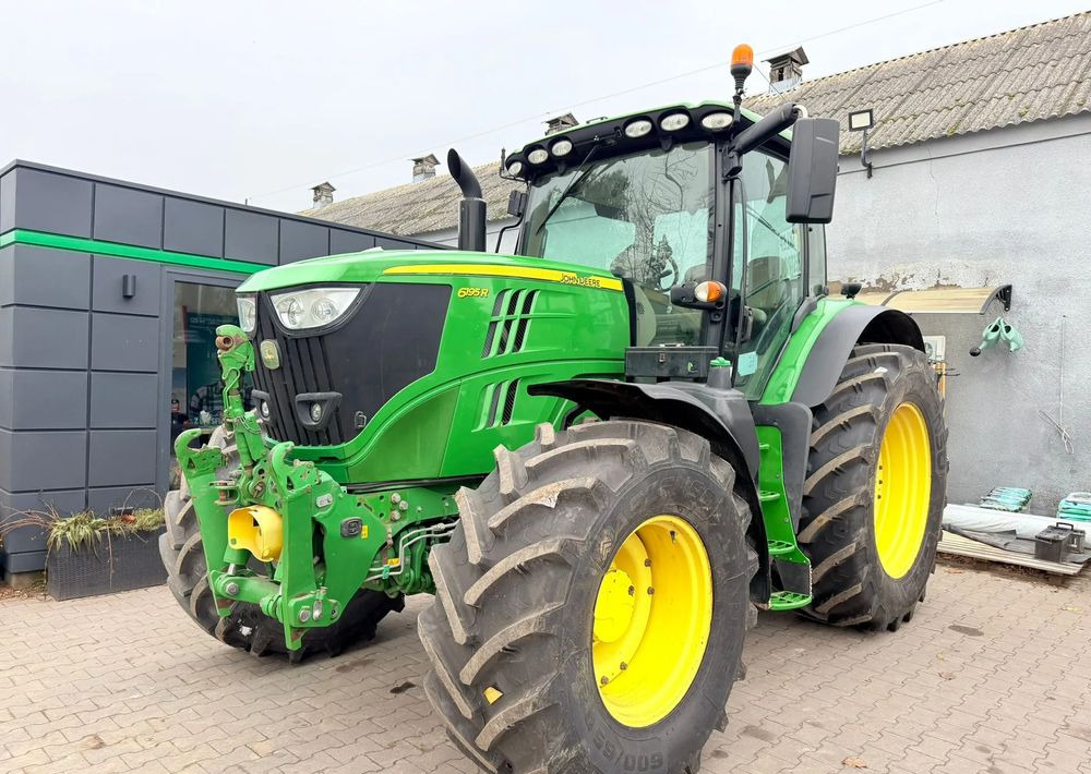 John Deere 6195 R - Трактор: фото 1 John Deere 6195 R - Трактор: фото 1