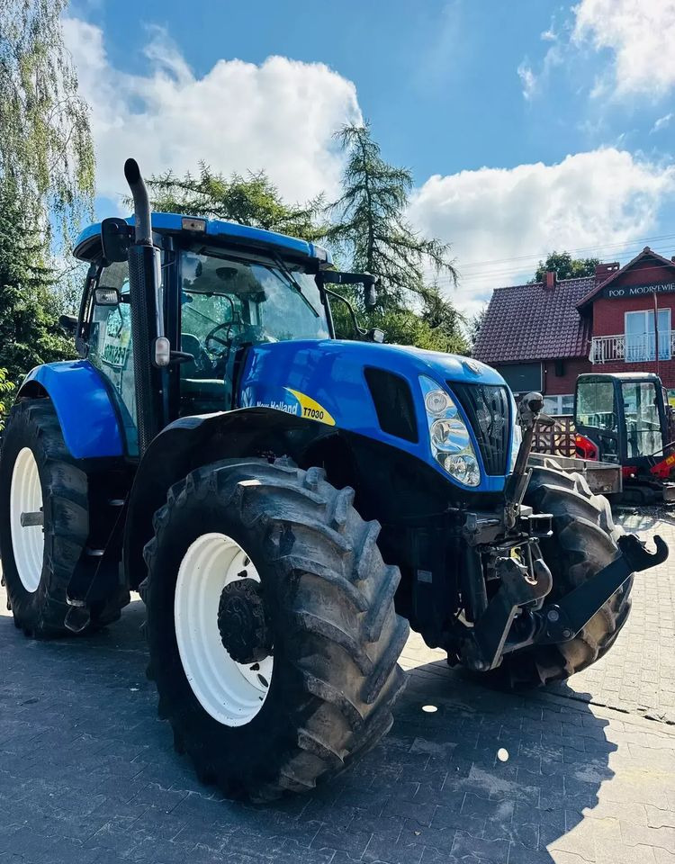 New Holland T7030 - Трактор: фото 1 New Holland T7030 - Трактор: фото 1