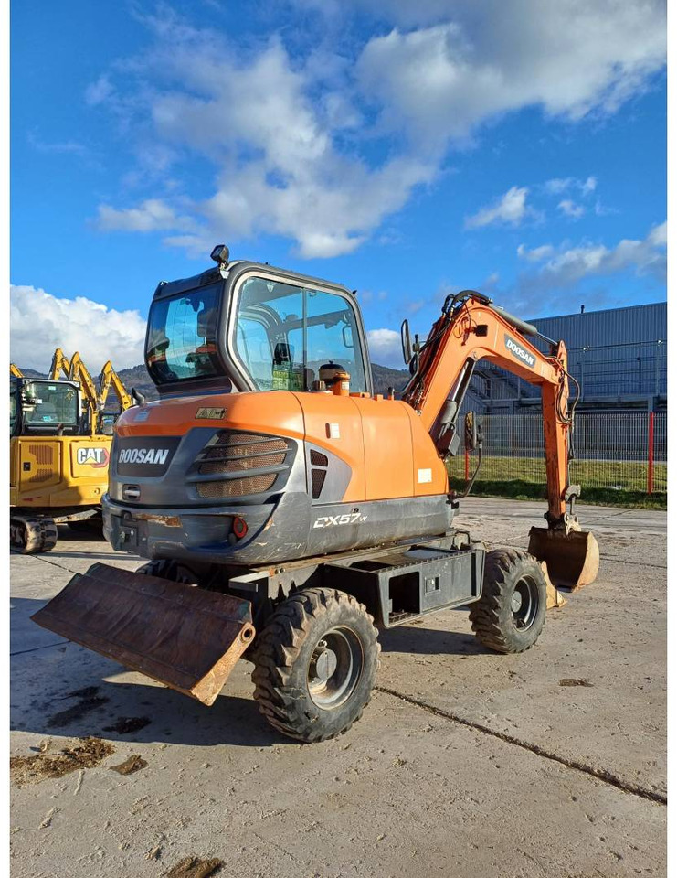 DOOSAN INFRACORE AMERICA CORP. DX57W-7 - Колёсный экскаватор: фото 3 DOOSAN INFRACORE AMERICA CORP. DX57W-7 - Колёсный экскаватор: фото 3