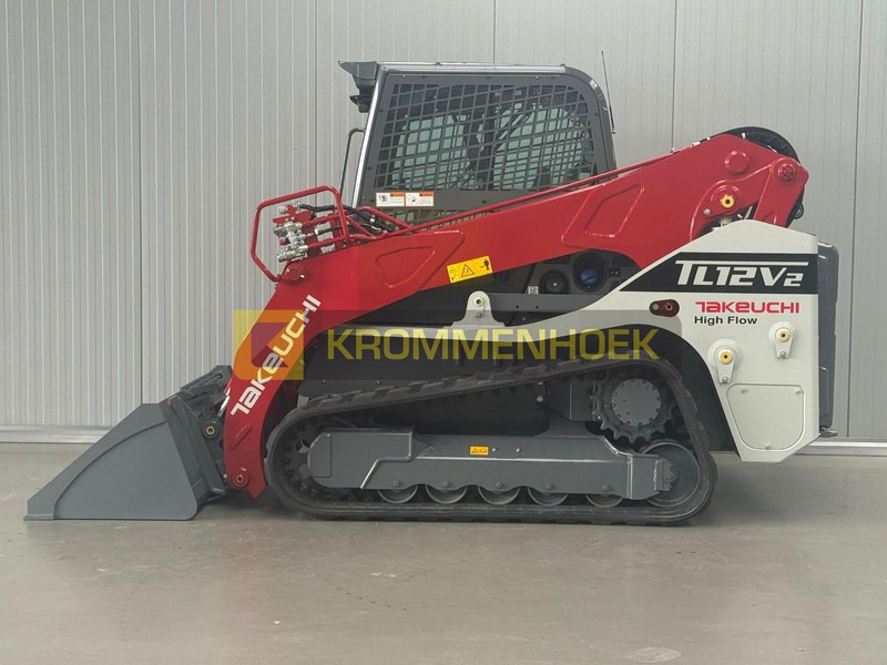 Takeuchi TL 12 V-2 - Мини-погрузчик с бортовым поворотом: фото 1 Takeuchi TL 12 V-2 - Мини-погрузчик с бортовым поворотом: фото 1