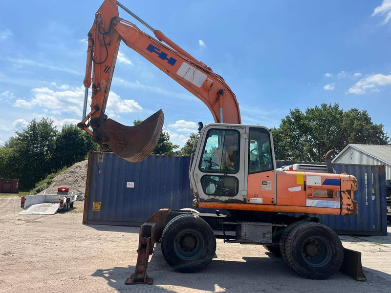 Fiat Hitachi FH 150W3 - Колёсный экскаватор: фото 1 Fiat Hitachi FH 150W3 - Колёсный экскаватор: фото 1
