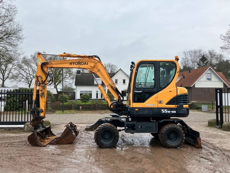 Hyundai Robex 55W-9A - Колёсный экскаватор: фото 2 Hyundai Robex 55W-9A - Колёсный экскаватор: фото 2