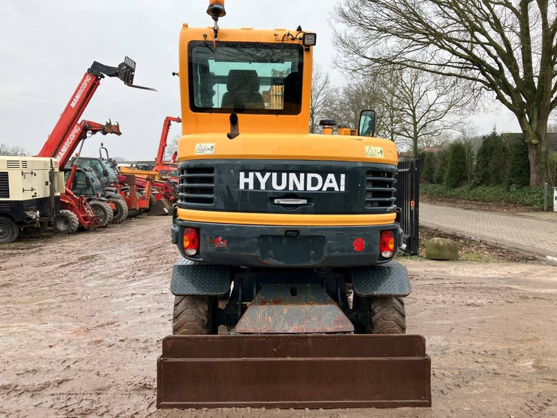 Hyundai Robex 55W-9A - Колёсный экскаватор: фото 4 Hyundai Robex 55W-9A - Колёсный экскаватор: фото 4