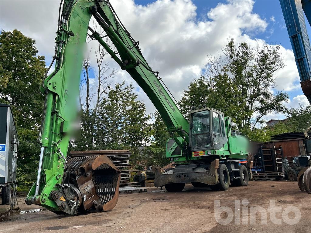 Sennebogen 825 M - Перегружатель: фото 1 Sennebogen 825 M - Перегружатель: фото 1