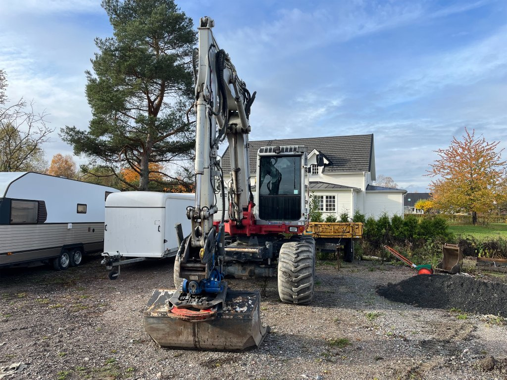 Takeuchi TB175W - Колёсный экскаватор: фото 2 Takeuchi TB175W - Колёсный экскаватор: фото 2