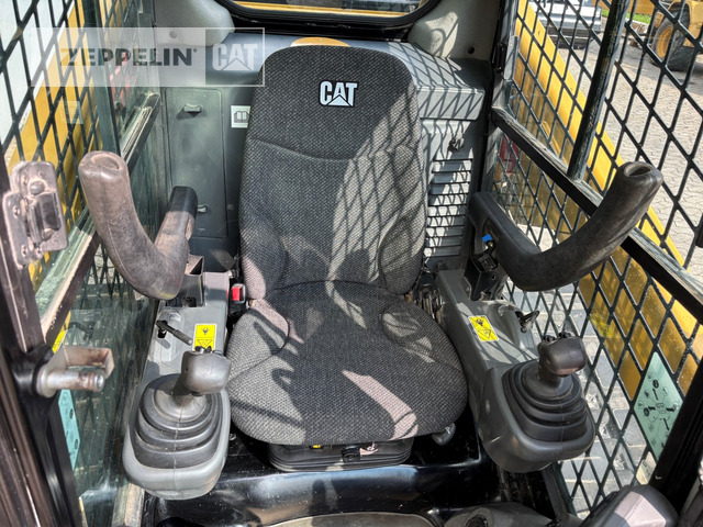 Мини-погрузчик с бортовым поворотом Cat 289D: фото 14